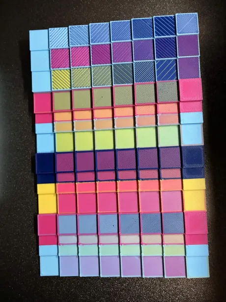 The BIGTEST board printed: a full board of tiles covering many filament pairs, mix ratios and pass structures at once