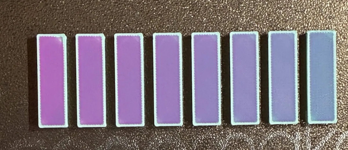 The same stacked-pass construction printed with a different filament pair, showing a much narrower achievable range